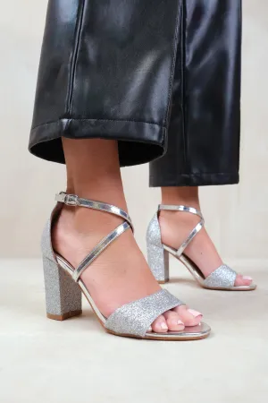 RUTH WIDE FIT HIGH BLOCK HEEL SANDALS WITH CROSS OVER ANKLE STRAP IN SILVER GLITTER